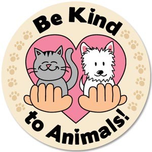 A cartoon of a smiling cat and dog held gently by two hands inside a heart, with the words Be Kind to Animals! surrounding them and paw prints around the edge.