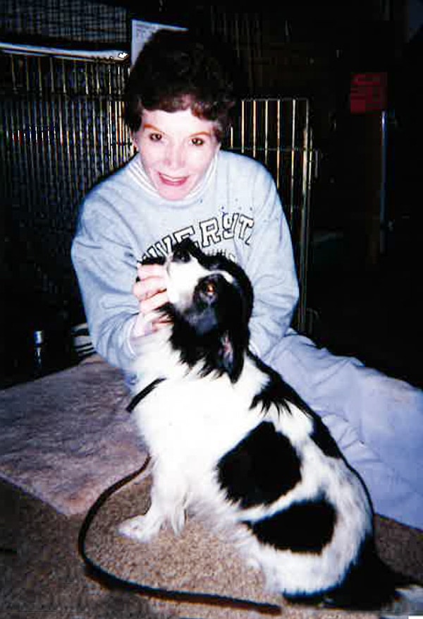 Peggy Barnish and black and white spaniel